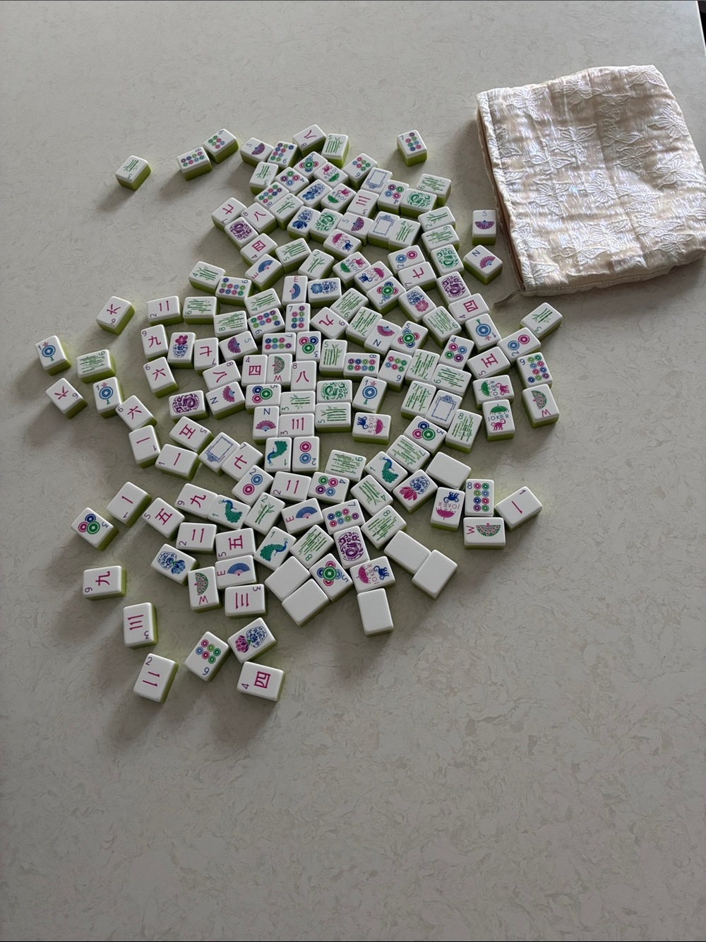 White Mahjong Tile Set with Green and Purple Accents